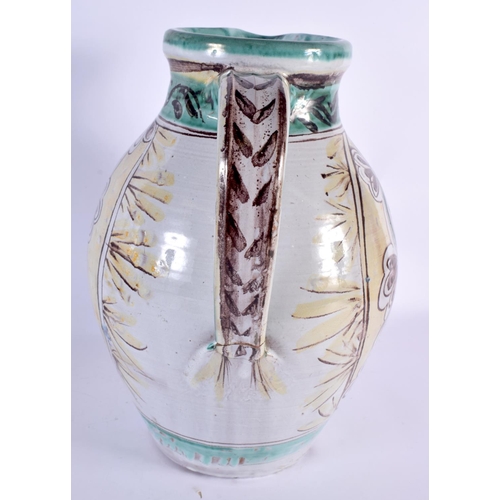 341 - A LARGE MID CENTURY EUROPEAN FAIENCE GLAZED POTTERY JUG possibly by a London based Italian potter, d... 