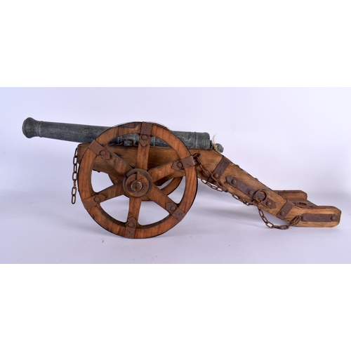 343 - THREE VINTAGE COUNTRY HOUSE CANNONS in various forms and sizes. Largest 55 cm x 20 cm. (3)