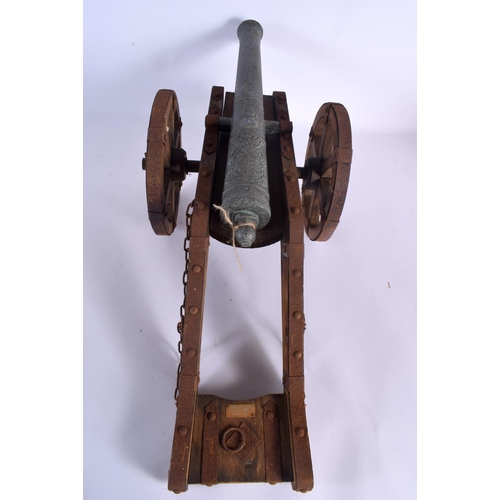 343 - THREE VINTAGE COUNTRY HOUSE CANNONS in various forms and sizes. Largest 55 cm x 20 cm. (3)