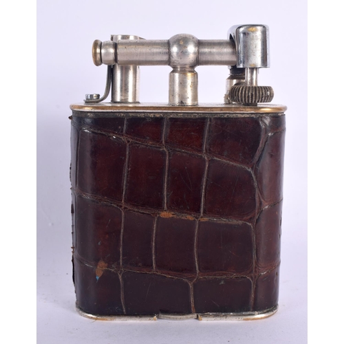 349 - A VINTAGE DUNHILL LEATHER WRAPPED LIGHTER. 11 cm x 8 cm.