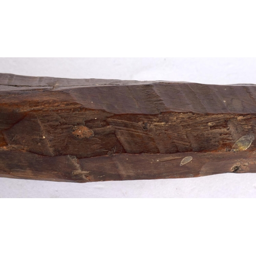 351 - A TRIBAL CARVED WOOD THROWING CLUB. 45 cm long.