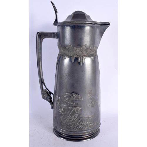 352 - A LARGE ART NOUVEAU ORIVIT PEWTER CLARET HUNTING JUG. 36 cm x 14 cm.