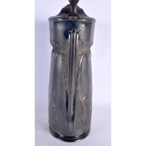 352 - A LARGE ART NOUVEAU ORIVIT PEWTER CLARET HUNTING JUG. 36 cm x 14 cm.