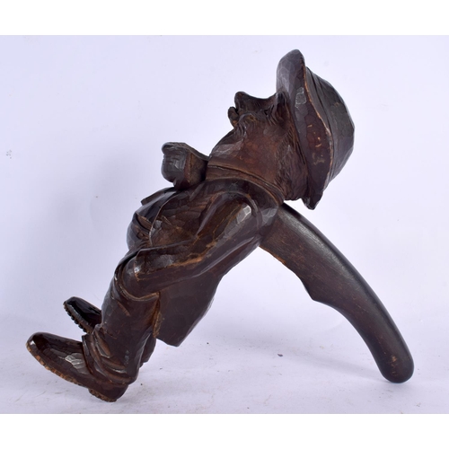 353 - A PAIR OF ANTIQUE BAVARIAN BLACK FOREST NUT CRACKERS. 23 cm high.