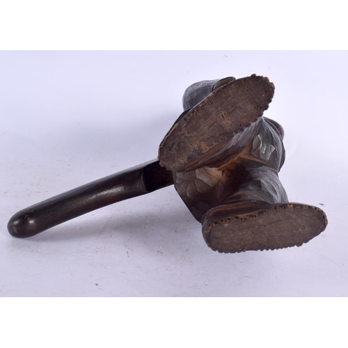 353 - A PAIR OF ANTIQUE BAVARIAN BLACK FOREST NUT CRACKERS. 23 cm high.