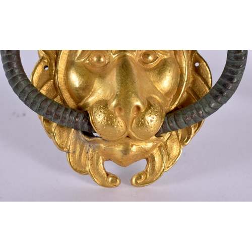 354 - A FINE PAIR OF GEORGE III ORMOLU AND BRONZE LION MASK HEADS Attributed to Matthew Boulton. 10 cm x 5... 