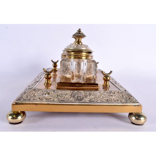 357 - A 19TH CENTURY ENGLISH GILT METAL AND SILVER PLATED INKWELL in the manner of Elkington, decorated al... 