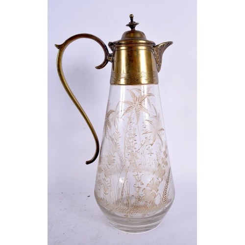 359 - AN AESTHETIC MOVEMENT ENGRAVED GLASS CLARET JUG. 27 cm high.