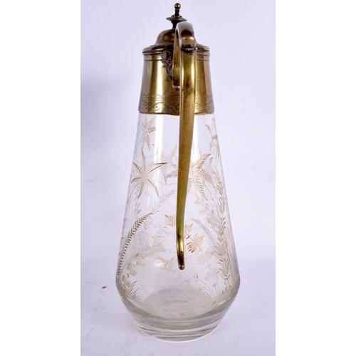 359 - AN AESTHETIC MOVEMENT ENGRAVED GLASS CLARET JUG. 27 cm high.