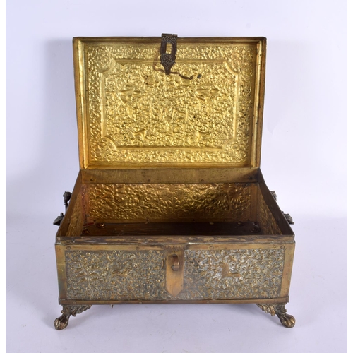 365 - A LARGE 19TH CENTURY INDIAN EMBOSSED COUNTRY HOUSE GILT METAL OVERLAID CASKET decorated with hunting... 