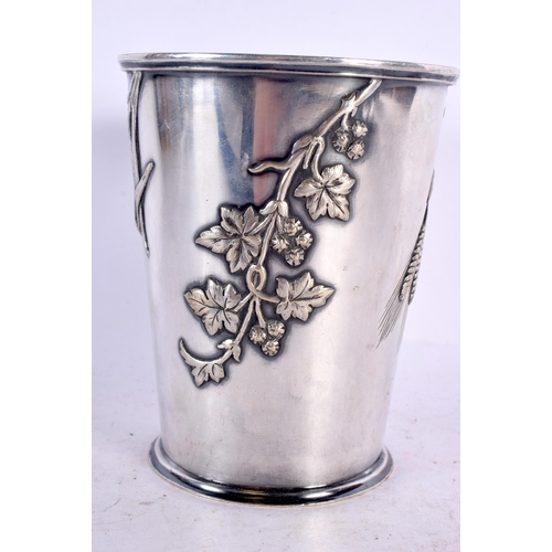 372 - AN AESTHETIC MOVEMENT SILVER PLATED BEAKER decorated with foliage. 12 cm x 9 cm.