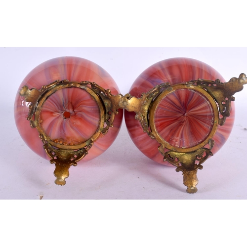 373 - A PAIR OF FINE EARLY 20TH CENTURY FRENCH MOTTLED GLASS VASES with gilt metal mask head mounts. 24.5 ... 