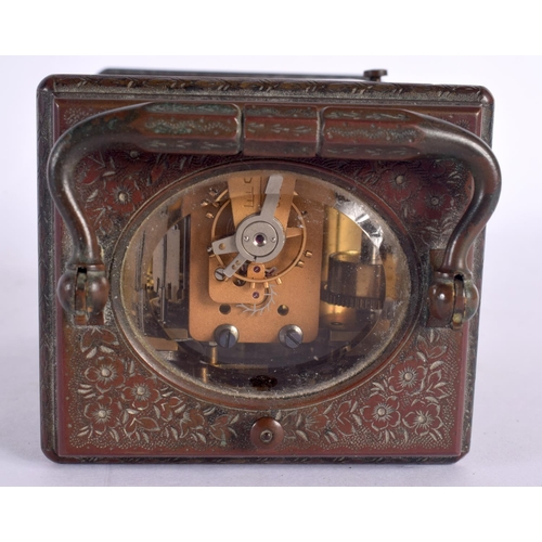 375 - A FINE 19TH CENTURY REPEATING BRASS CARRIAGE CLOCK with alarm, engraved all over with foliage and vi... 