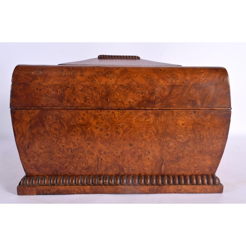 378 - A LARGE MID 19TH CENTURY ENGLISH BURR WALNUT INLAID CASKET decorated with a star flower motif. 42 cm... 