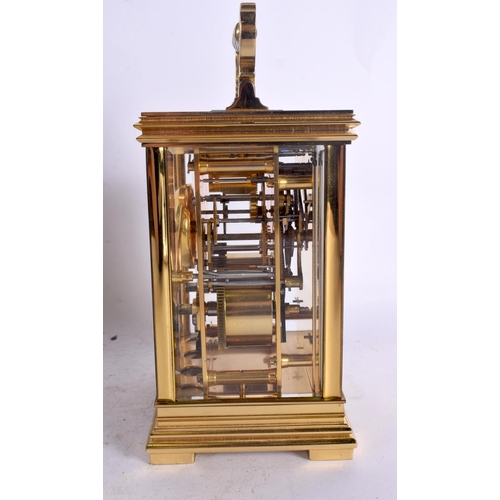 382 - A BOXED TAYLOR & BLIGH CARRIAGE CLOCK. 17 cm high inc handle.