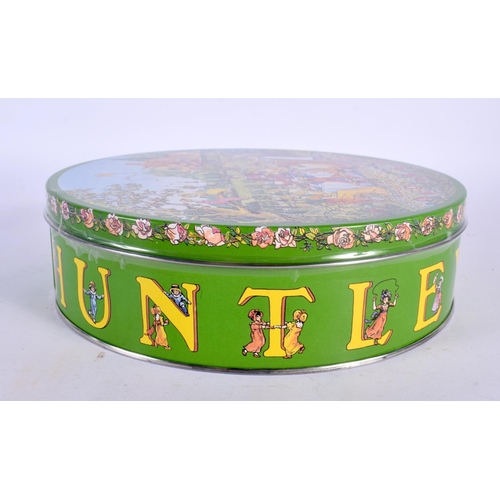 392 - A HUNTLEY AND PALMERS NAUGHTY DOGGY BISCUIT TIN AND COVER. 18 cm diameter.