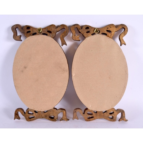 403 - A PAIR OF CONTEMPORARY PORTRAIT MINIATURES. 25 cm x 12 cm.