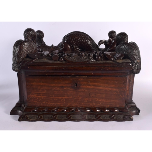 408 - A LARGE 19TH CENTURY CONTINENTAL CARVED WOOD CASKET possibly Italian, formed with a fish beside four... 