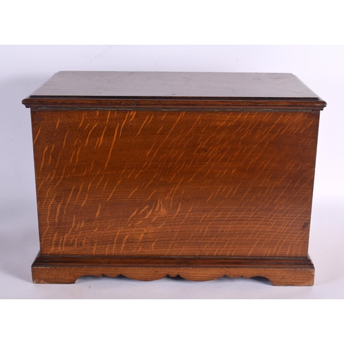 410 - A LOVELY LATE VICTORIAN GENTLEMAN'S OAK DESK CABINET the top rising, to reveal a fall front with pop... 