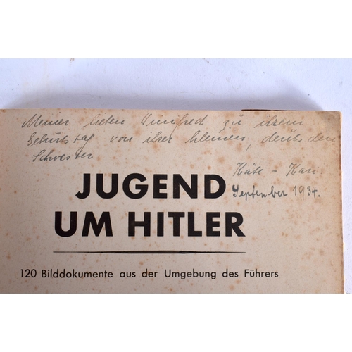 412 - THREE GERMAN MILITARY ADOLF HITLER MAGAZINES together with similar post cards. (qty)