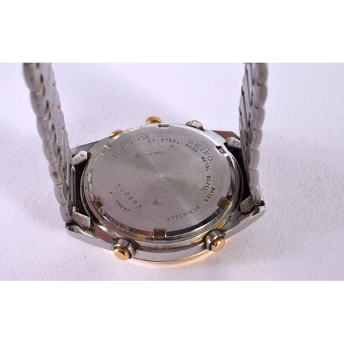 418 - A SEIKO CHRONOGRAPH WRISTWATCH. 3.5 cm wide.