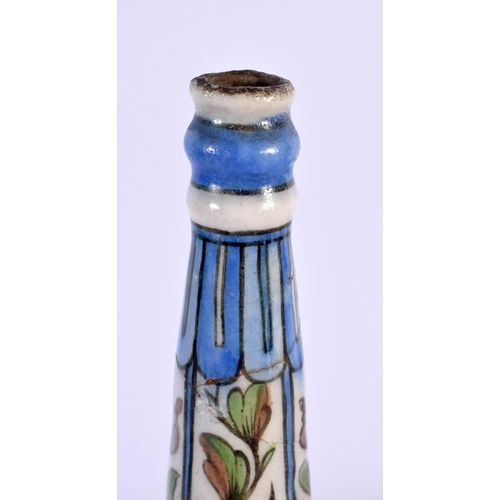 426 - A 19TH CENTURY PERSIAN MIDDLE EASTERN FAIENCE ROSE WATER SPRINKLER. 29 cm high.