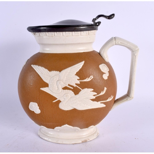 431 - A RARE BROWNFIELD & CO AESTHETIC MOVEMENT POTTERY EWER. 21 cm x 15 cm.