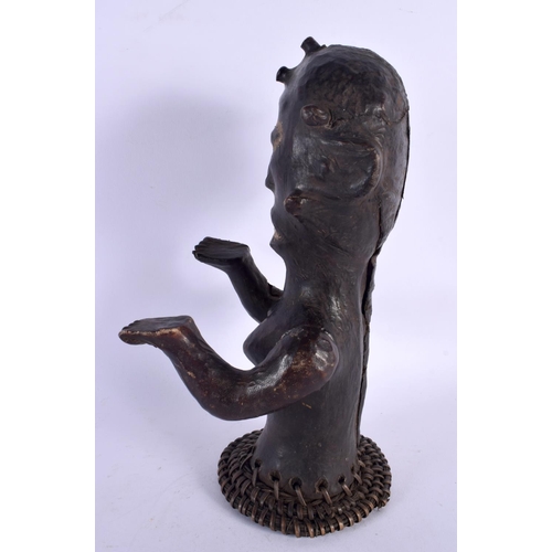 438 - AN EARLY 20TH CENTURY AFRICAN TRIBAL SKIN COVERED FERTILITY FIGURE. 30 cm x 10 cm.