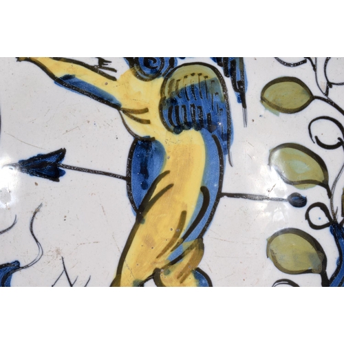 47 - A VERY RARE 17TH CENTURY DELFT TIN GLAZED SCALLOPED BOWL painted with a winged figure within a lands... 