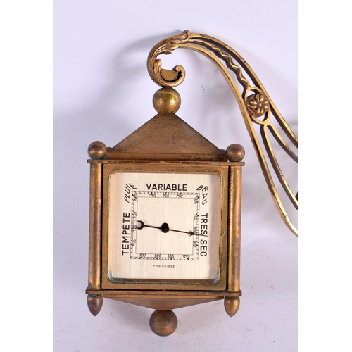 481 - AN UNUSUAL VINTAGE ANGELETTI FOUR SIDED BRASS CLOCK. 15 cm x 18 cm.