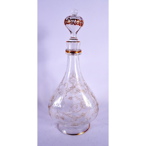 542 - AN EARLY 20TH CENTURY EUROPEAN CRYSTAL GLASS DECANTER AND STOPPER engraved with vines and motifs. 33... 