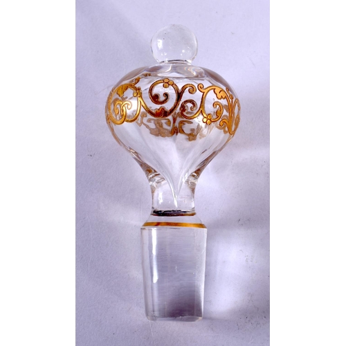 542 - AN EARLY 20TH CENTURY EUROPEAN CRYSTAL GLASS DECANTER AND STOPPER engraved with vines and motifs. 33... 