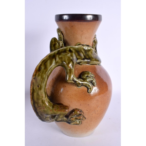 548 - A LARGE ANTIQUE ENGLISH STONEWARE JUG in the manner of Martin Brothers. 27 cm x 15 cm.
