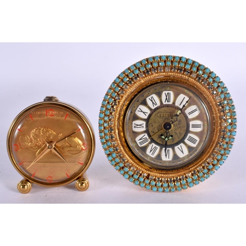 550 - TWO NOVELTY CLOCKS one inset with turquoise. Largest 8 cm wide. (2)
