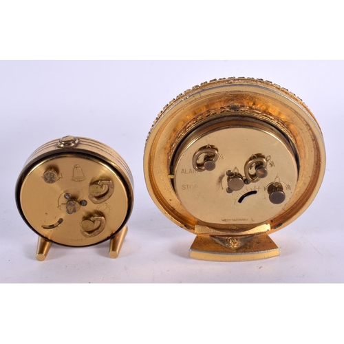550 - TWO NOVELTY CLOCKS one inset with turquoise. Largest 8 cm wide. (2)