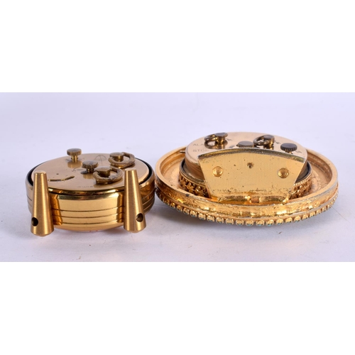550 - TWO NOVELTY CLOCKS one inset with turquoise. Largest 8 cm wide. (2)
