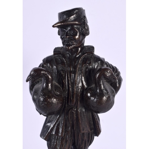 556 - French School (19th Century) Bronze, Figure holding geese. 27 cm high.