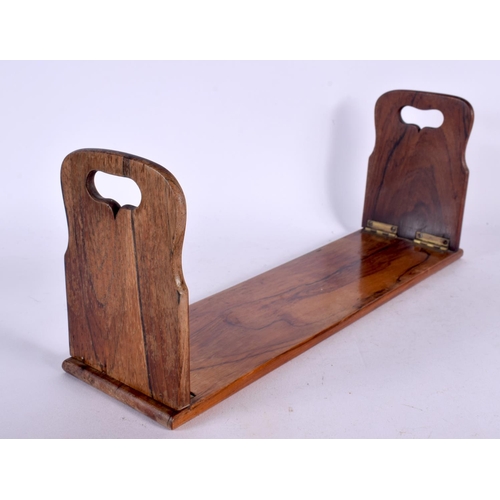 557 - AN EARLY VICTORIAN ROSEWOOD BOOK SLIDE. 34 cm x 13 cm.