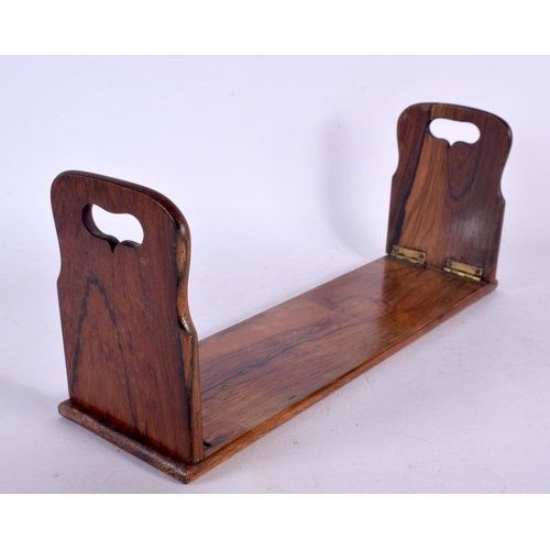 557 - AN EARLY VICTORIAN ROSEWOOD BOOK SLIDE. 34 cm x 13 cm.