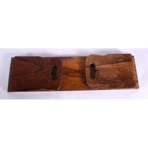 557 - AN EARLY VICTORIAN ROSEWOOD BOOK SLIDE. 34 cm x 13 cm.