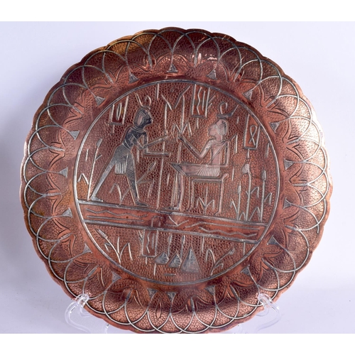 56 - A PAIR OF 19TH CENTURY MIDDLE EASTERN EGYPTIAN STYLE SILVER INLAID DISHES decorated with figures. 22... 