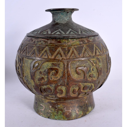 564 - A 19TH CENTURY CHINESE ARCHAIC STYLE BRONZE VESSEL AND COVER decorated to the base rim with calligra... 