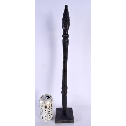 571 - A LARGE 19TH CENTURY CONTINENTAL CARVED TRIBAL CHIEFS STAFF of figural form. 51 cm high.