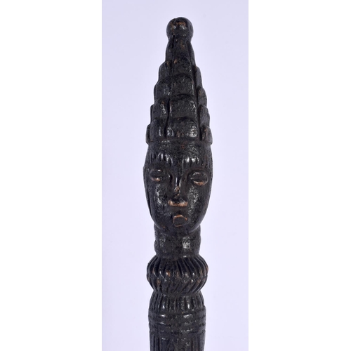 571 - A LARGE 19TH CENTURY CONTINENTAL CARVED TRIBAL CHIEFS STAFF of figural form. 51 cm high.