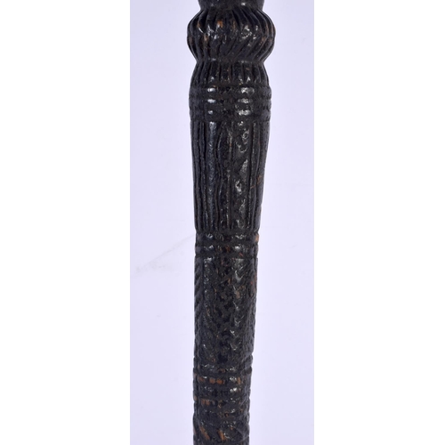 571 - A LARGE 19TH CENTURY CONTINENTAL CARVED TRIBAL CHIEFS STAFF of figural form. 51 cm high.