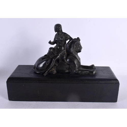 574 - A 19TH CENTURY EUROPEAN GRAND TOUR FIGURE OF CLEOPATRA modelled upon an ebonised sphinx. 34 cm x 18 ... 
