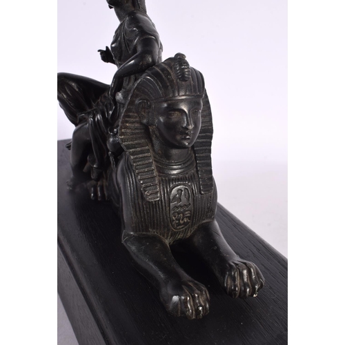 574 - A 19TH CENTURY EUROPEAN GRAND TOUR FIGURE OF CLEOPATRA modelled upon an ebonised sphinx. 34 cm x 18 ... 
