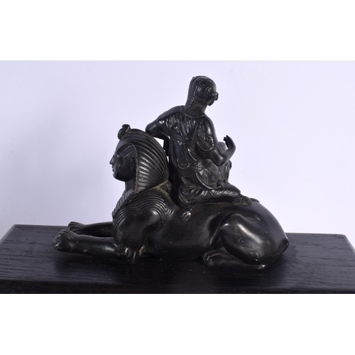 574 - A 19TH CENTURY EUROPEAN GRAND TOUR FIGURE OF CLEOPATRA modelled upon an ebonised sphinx. 34 cm x 18 ... 