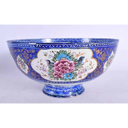 575 - A 19TH CENTURY MIDDLE EASTERN PERSIAN ENAMEL BOWL painted with flowers. 18 cm diameter.