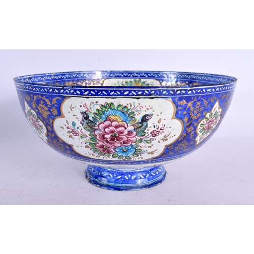 575 - A 19TH CENTURY MIDDLE EASTERN PERSIAN ENAMEL BOWL painted with flowers. 18 cm diameter.